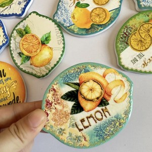 Wholesale Ceramic Lemon shaped Fridge Magnet with 3D embossed printing and gold blocked for gifts